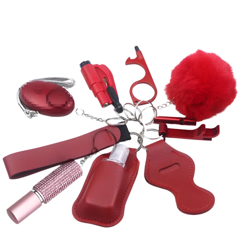 Self defence weapon keychain set in red. Alarm, mace, hand sanitiser, pompom
