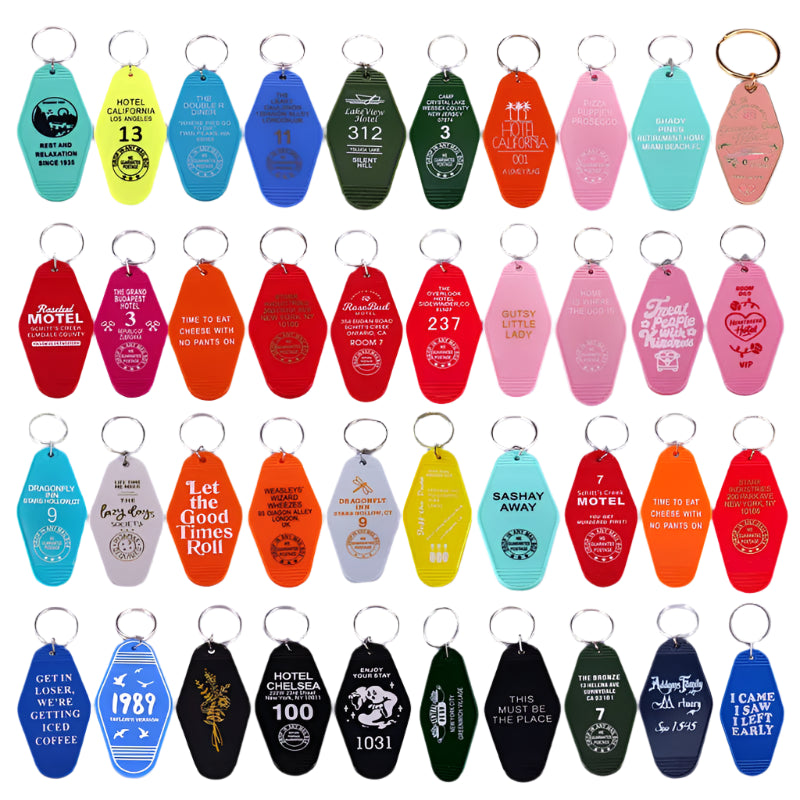 Vintage Motel Key Chain collection features colorful, retro-style keychains with humorous or inspirational quotes. Their assorted shapes and vibrant hues—red, blue, green, and pink—capture the charm of vintage hotel key rings.