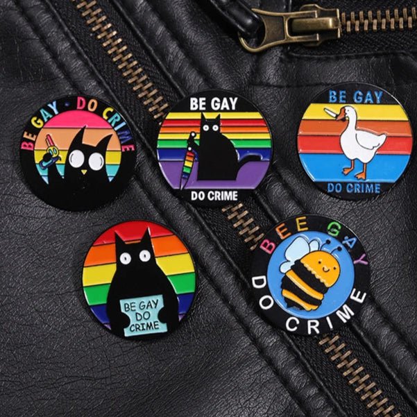 Be Gay Do Crime badge - rainbow, cats, duck, bees