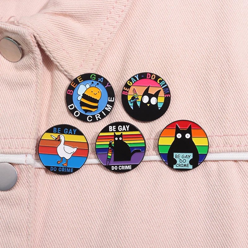 Be Gay Do Crime badge - rainbow, cats, duck, bees