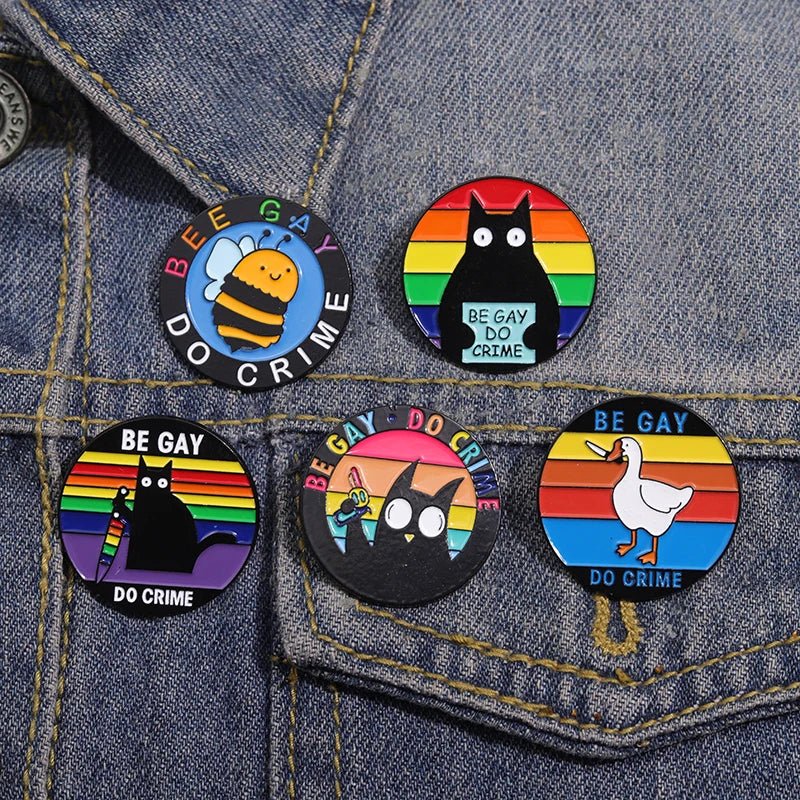 Be Gay Do Crime badge - rainbow, cats, duck, bees