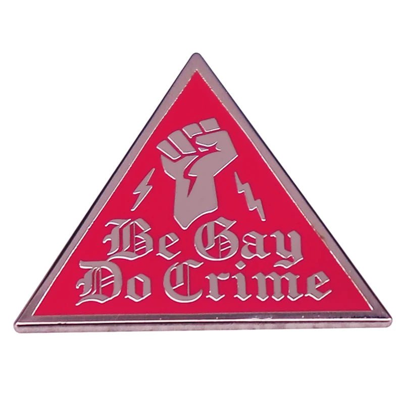Be Gay Do Crime red and silver triangle enamel pin with fist