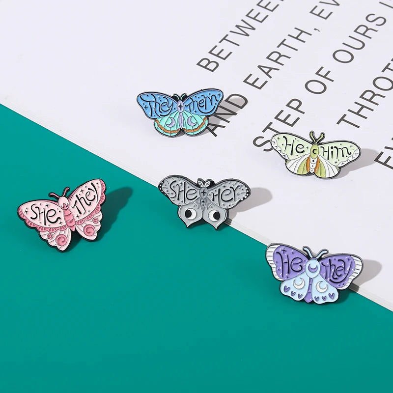 Creative pronoun badges: moth, butterfly, cat, frog, planchette - Gay Skate - Creative pronoun badges: moth, butterfly, cat, frog, planchette - Creative pronoun badges: moth, butterfly, cat, frog, planchette