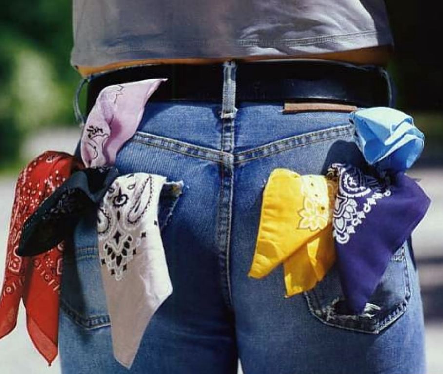 The "hanky code" is a historical method of non-verbal communication used within the LGBTQ+ community, particularly among gay men, to indicate sexual preferences and interests. It involves wearing a colored handkerchief, or "hanky," in a specific pocket to signal whether the wearer is a "top" (dominant) or "bottom" (submissive) and to indicate specific sexual fetishes or activities