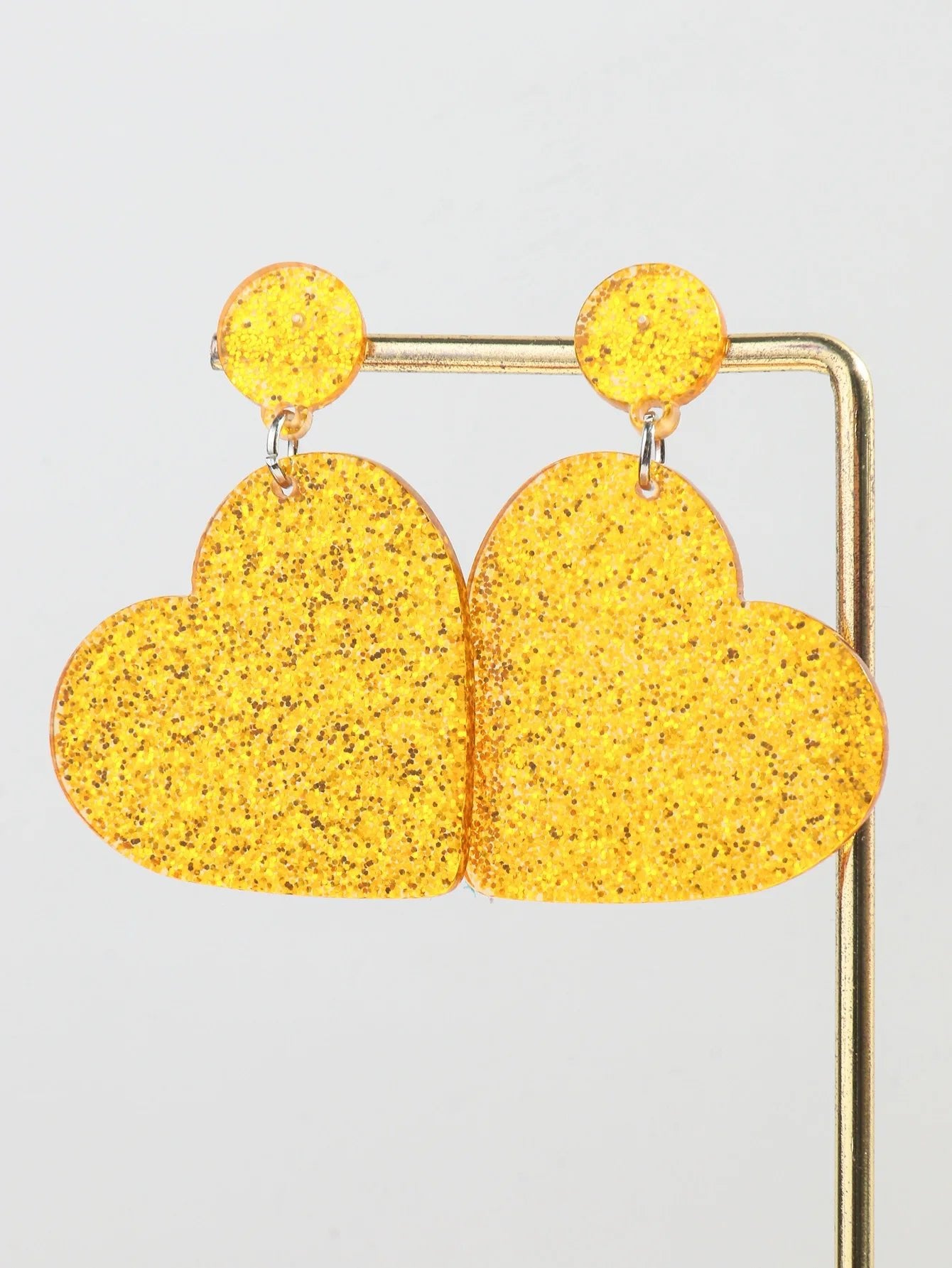 Gold glitter love heart dangling earrings