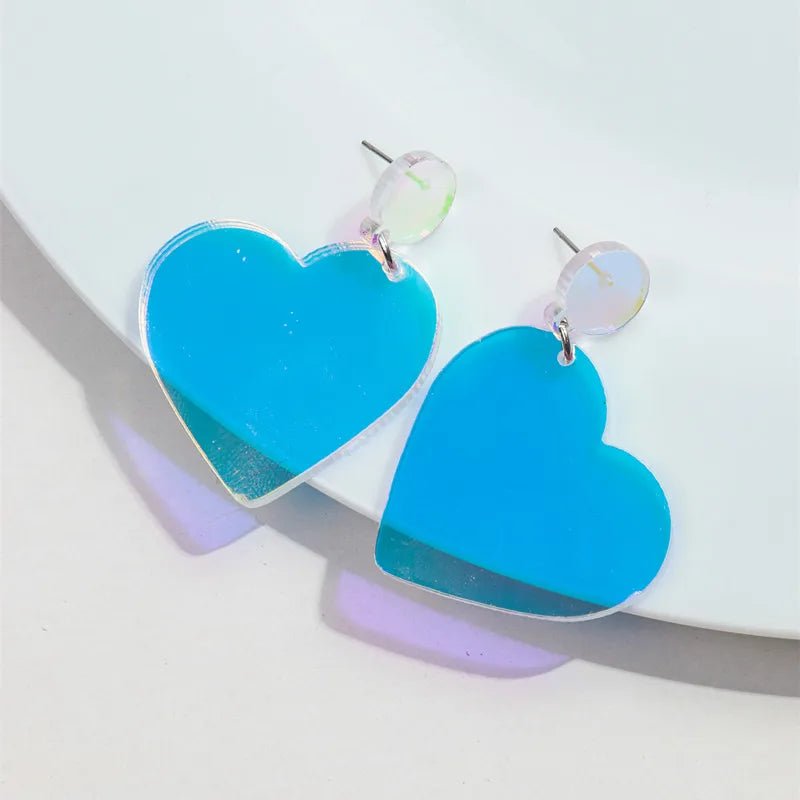 Clear blue love heart dangling earrings