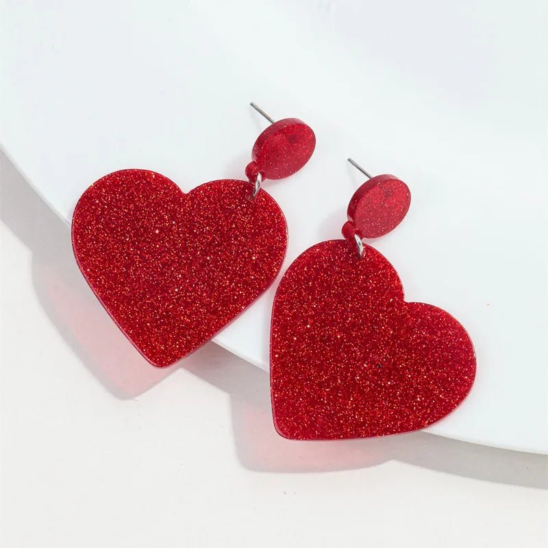 Red glitter love heart dangling earrings