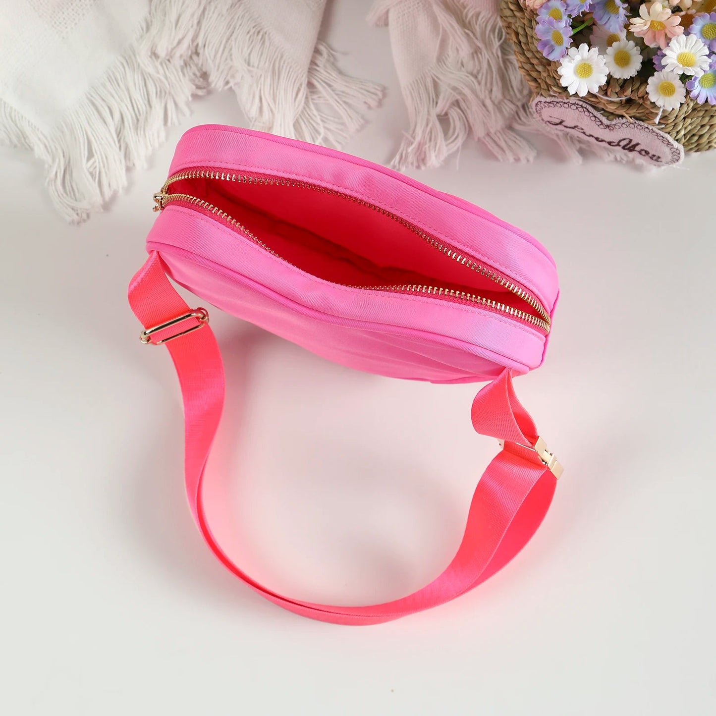 Love heart shaped bag with waist strap and gold details. This Heart Shaped Crossbody Bag or Fanny Pack is perfect for your skating adventures. Its unique love heart design is a fashionable statement piece, while the bag's practicality offers hands-free convenience. Available in kawaii shades of pink, teal, and tie dye, or make a bold statement with red.