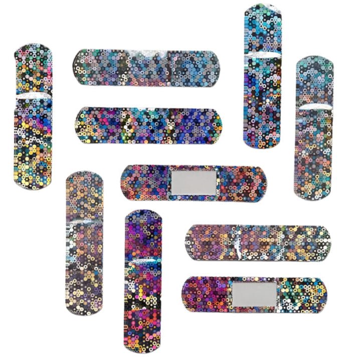A set of fifty Holographic Colourful Band Aids from Gay Skate, featuring vibrant colors like blue, pink, orange, and silver sequins on a white backdrop—ideal for a stylish addition to any first aid kit.