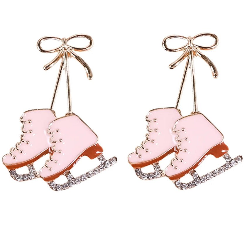 The charming Gay Skate Ice Skates enamel earrings feature pink ice skate shapes with glittery blades and a cute bow on top