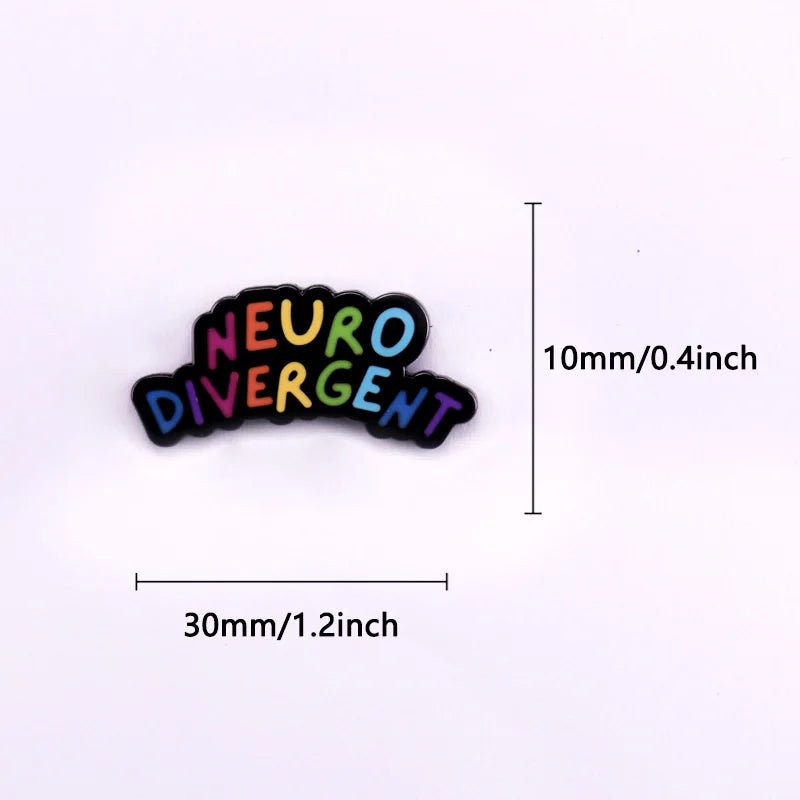 The Neurodivergent Rainbow Badge from Gay Skate features the text "Neuro Divergent" in a vibrant rainbow font. The pin measures 10mm (0.4 inch) in height and 30mm (1.2 inch) in width. Celebrate neuro diversity, adhd, audh, autism, ASD, PTSD and being queer. Rainbow pride flag for LGBTIQ ND neuroqueers