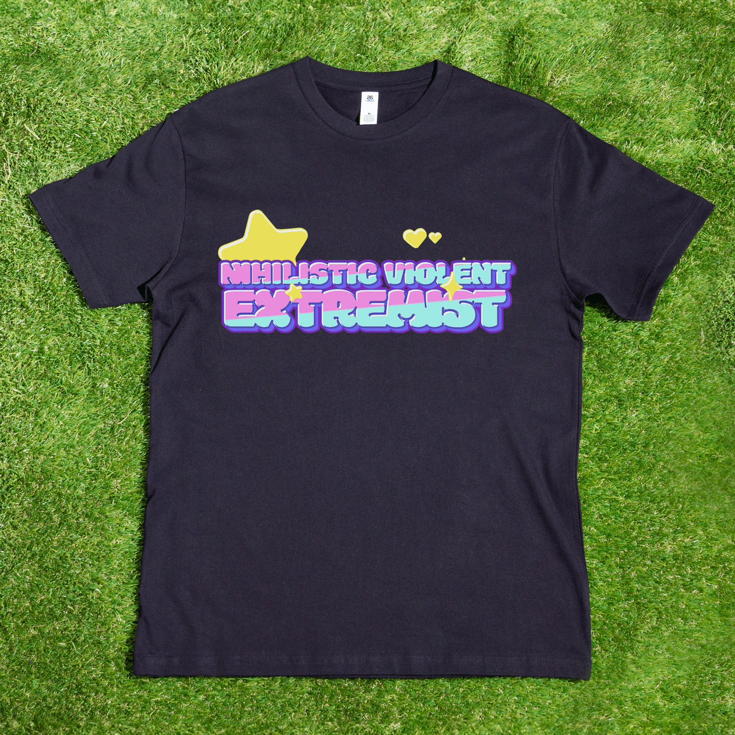 The Nihilistic Violent Extremist - Local hand printed satire t-shirt features colorful text, a yellow star, and hearts on a black AS Colour tee. Proudly trans and queer owned.