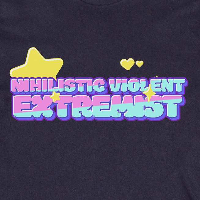 Bold, colorful bubble letters read "Nihilistic Violent Extremist," accented by stars and hearts on a dark background. This playful satire crop tee is locally printed and queer and trans owned.