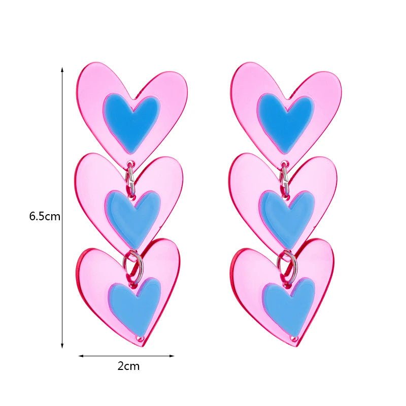 Pair of pink and blue heart-shaped drop earrings