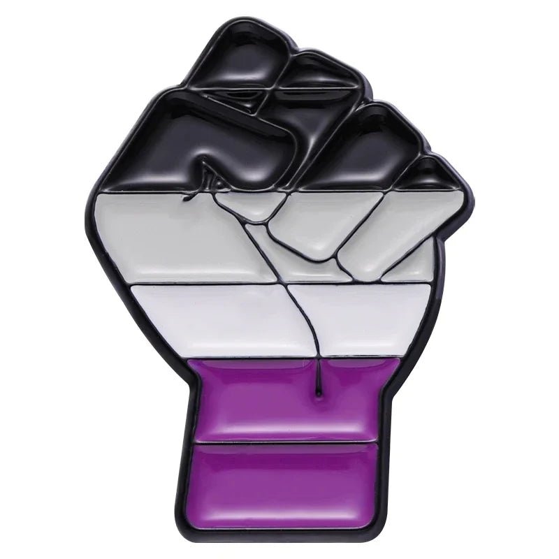 Show your support with the Pride Flag Fist enamel pins, featuring an asexual pride fist divided into black, gray, white, and purple stripes—plus pins for Bi, Pan, Lesbian, Rainbow, and Trans flags. Celebrate LGBTQ+ Pride in style!.