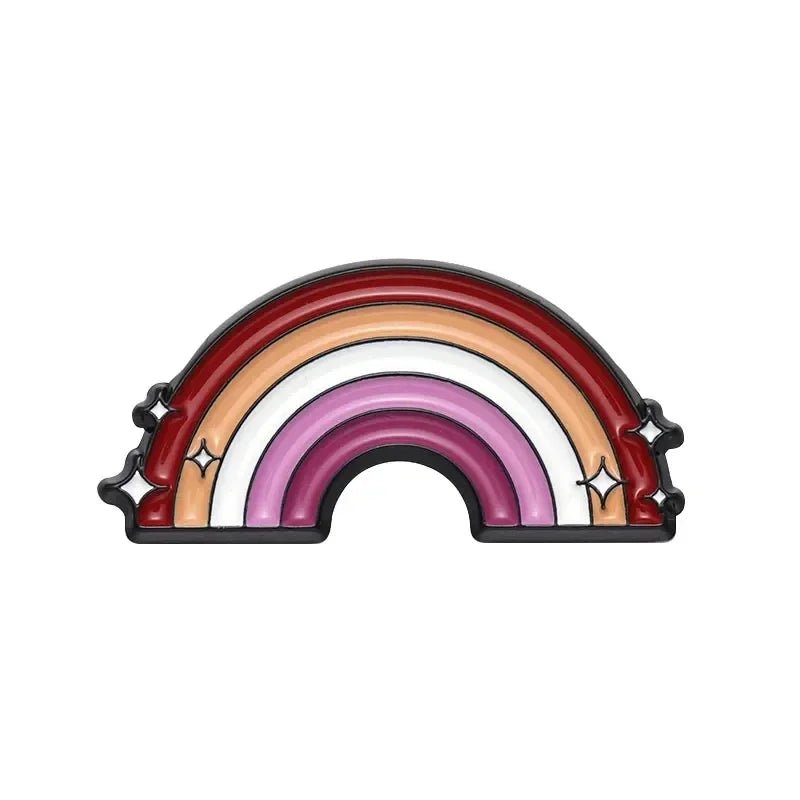 Show your LGBTQ+ Pride with our Pride Flag Fist enamel pin, featuring rainbow bands in red, orange, pink, and white outlined in black with sparkles—perfect for adding flair to your enamel pins collection.