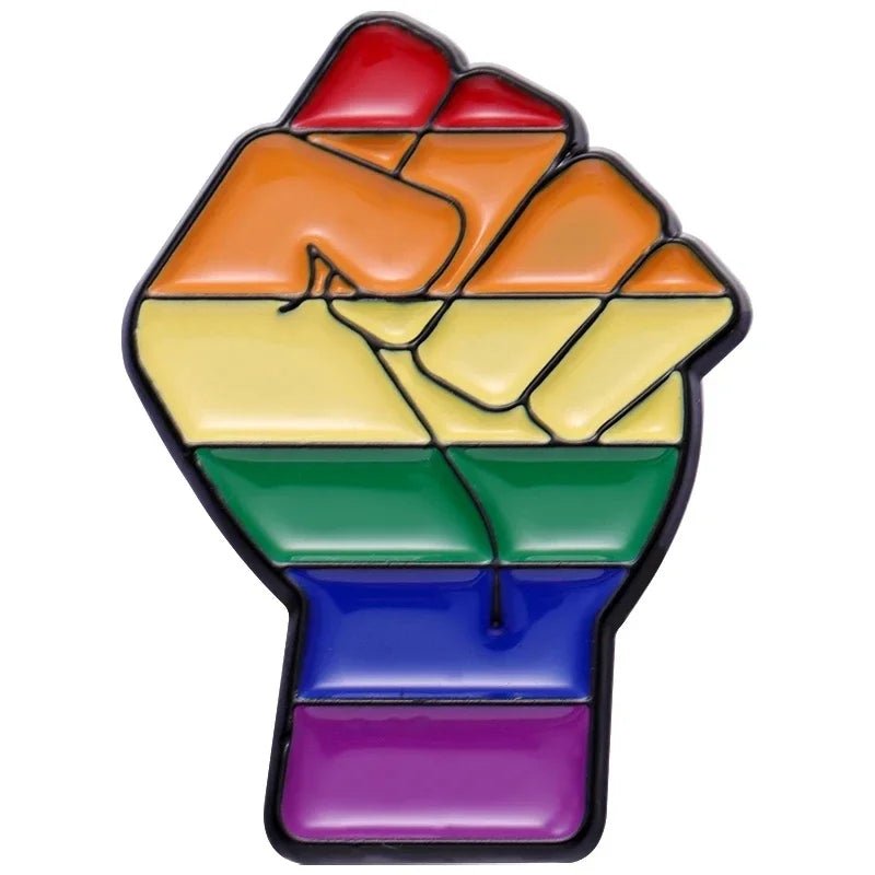 Show your LGBTQ+ Pride and solidarity with Pride Flag Fist enamel pins, available in Ace, Bi, Pan, Lesbian, Rainbow, and Trans flag colors—perfect for unique Pride Flag Pins.
