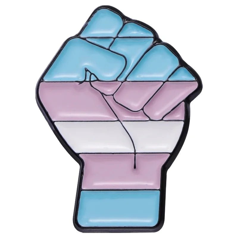 Show your support for LGBTQ+ Pride with the Pride Flag Fist enamel pins, featuring a raised fist in ace, bi, pan, lesbian, rainbow, and trans flag colors—symbols of strength and solidarity.