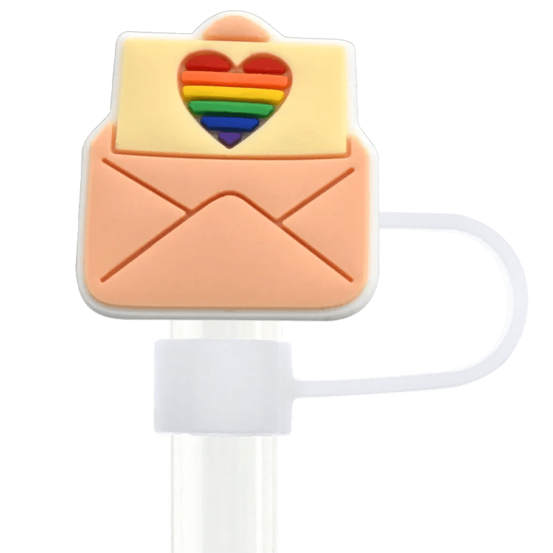 A decorative stanley straw shaped like an envelope with an open flap displays a rainbow-striped heart, adding Pride flair. A white attachment band is visible at the bottom, perfect for fans of the Pride straw topper that fits Stanley Cup straws.