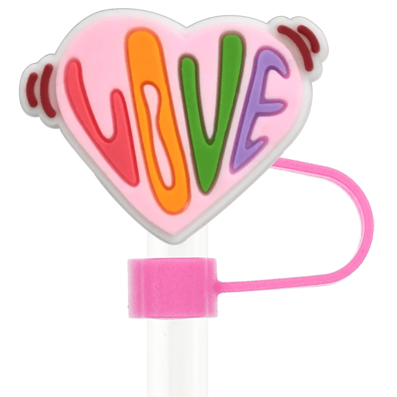 The Pride straw topper fits Stanley Cup straws, featuring a heart shape with "LOVE" in multicolored letters, reflecting pride designs. A matching loop adds rainbow flair to your essentials.