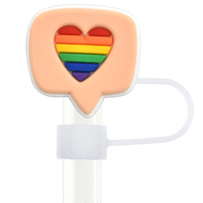 The Pride straw topper, designed for Stanley Cup straws, features a transparent speech bubble with a rainbow heart, complemented by a white attachment loop, all reflecting its pride-themed roots.