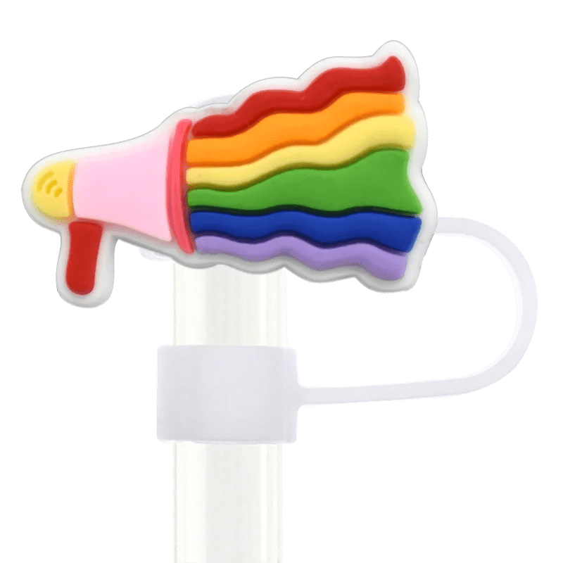 The Pride straw topper fits Stanley Cup straws, featuring a colorful, rainbow-themed cap attached to a white cover. Its rubber design mimics a paint tube with flowing rainbow colors for a vibrant, whimsical look inspired by Rainbow Pride.