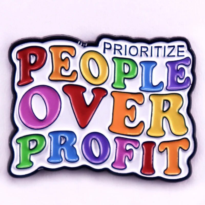 Prioritize People Over Profit rainbow enamel pin