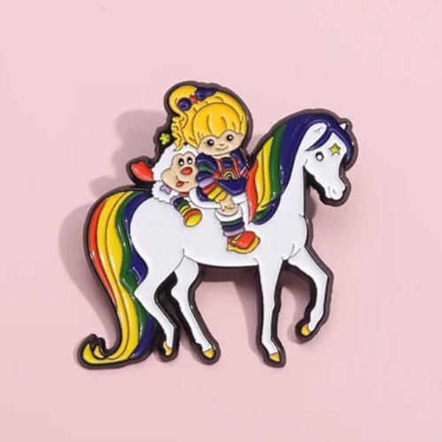 Rainbow Brite cartoon colourful enamel pin of a girl riding a rainbow unicorn horse