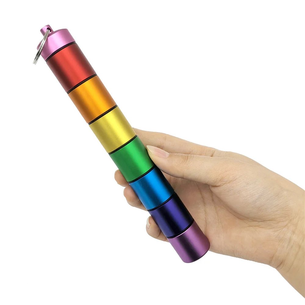 Rainbow medication organiser - 7 metal cylinders