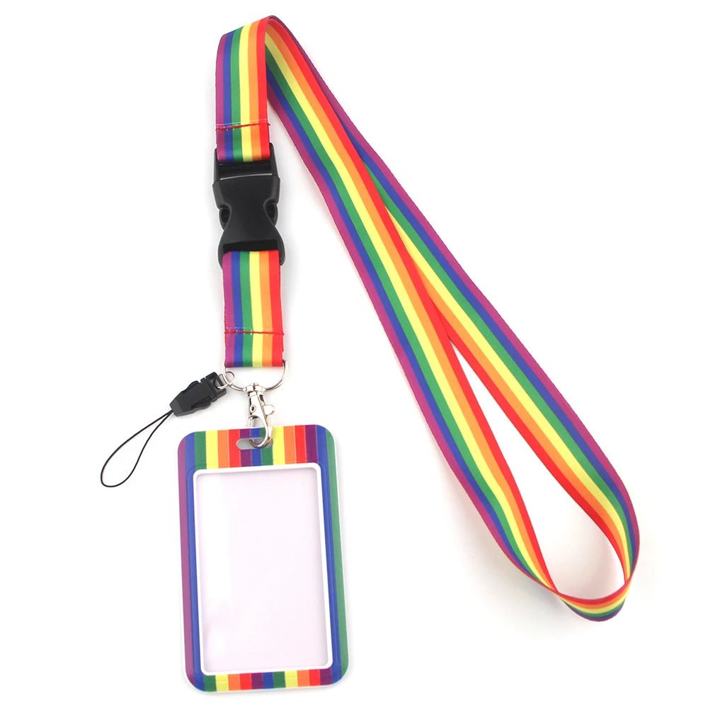 The Rainbow Pass Holder ID Lanyard includes a pride flag-inspired rainbow-striped design, matching ID card holder with a clear center for visibility, and features a convenient black buckle for easy attachment.