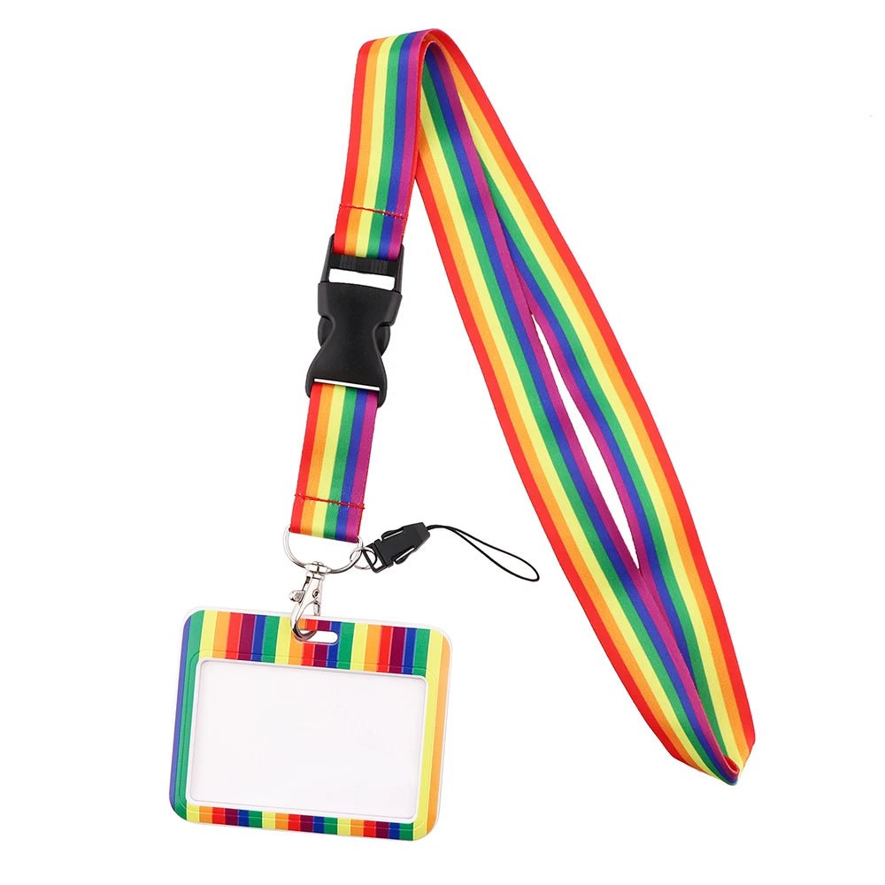 The Rainbow Pass Holder ID Lanyard is a vibrant pride flag accessory that features a striped cardholder with a clear ID view, attached by a sturdy black clip for bold functionality.