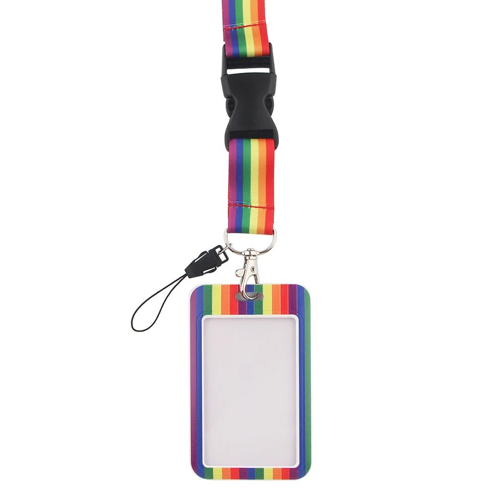 The Rainbow Pass Holder ID Lanyard features a vibrant pride flag design, a rectangular holder with a clear window for displaying your card or ID, and a lanyard with a plastic buckle for easy release.