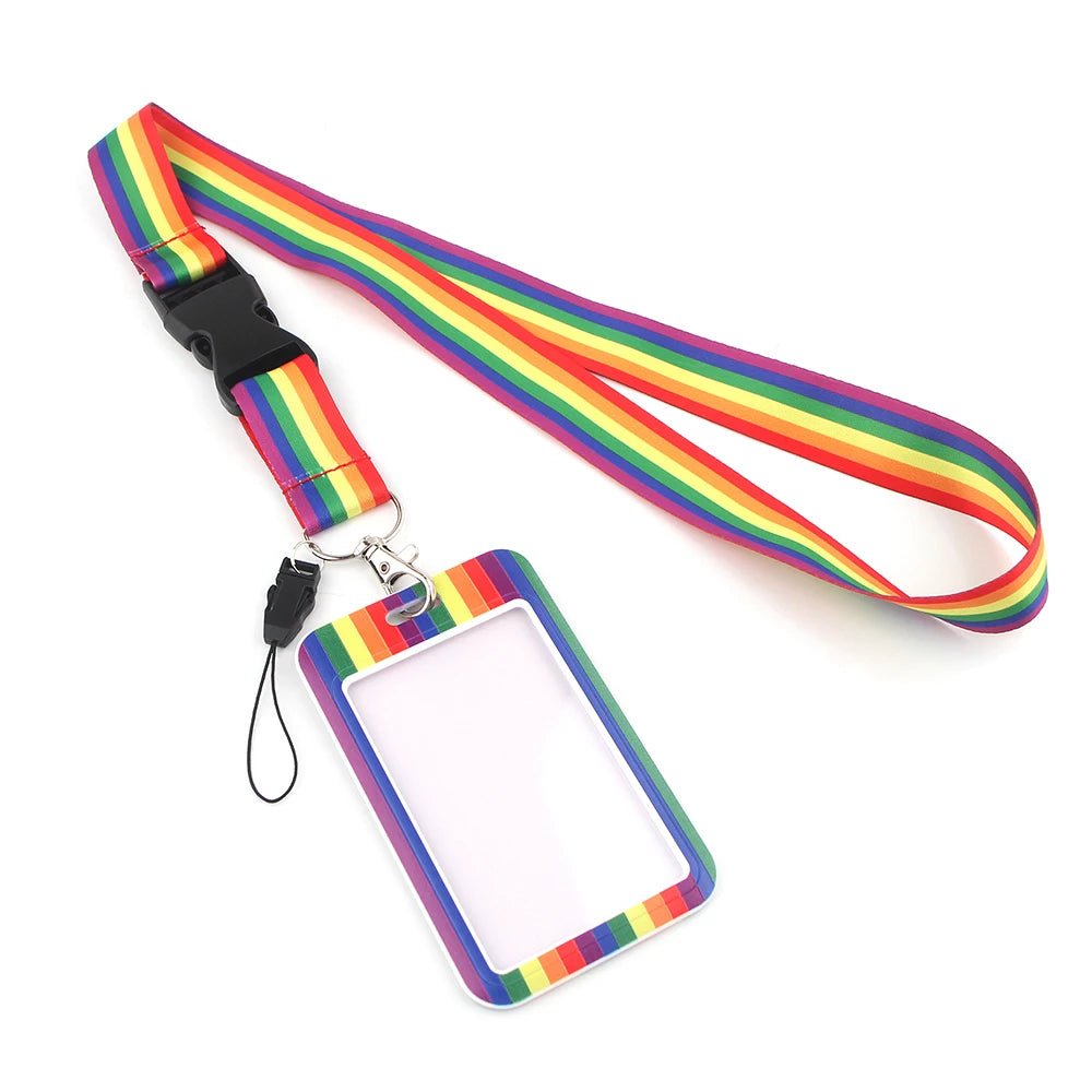 The Rainbow Pass Holder ID Lanyard features a vibrant pride flag design with a detachable buckle and an ID card holder. Its clear window displays a customizable white background.