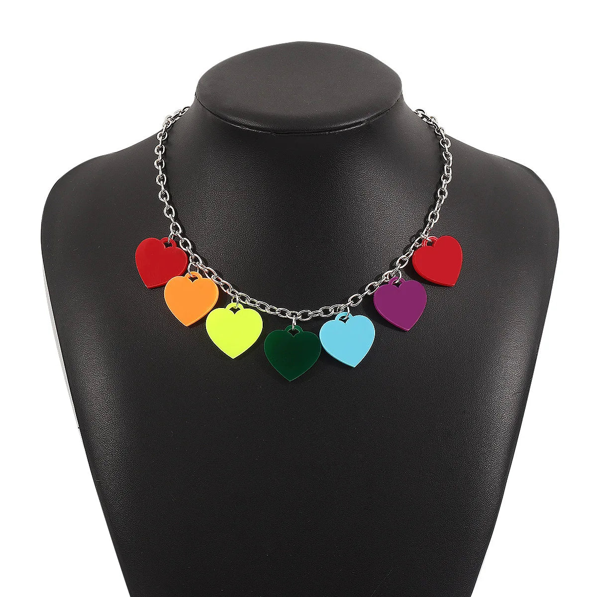 The Rainbow Pride Acrylic Necklace - 3 designs features seven colorful love hearts on a silver chain, making it a standout rainbow accessory and perfect for pride.