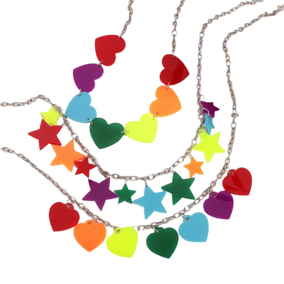 The Rainbow Pride Acrylic Necklace set includes three silver chain necklaces: one with heart charms, one with star charms, and one combining both. Each features colorful rainbow acrylic charms—perfect for adding a vibrant pride touch to any outfit.