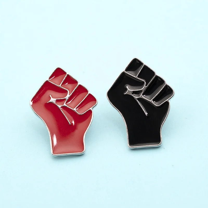 Red or Black raised fist - solidarity enamel pin