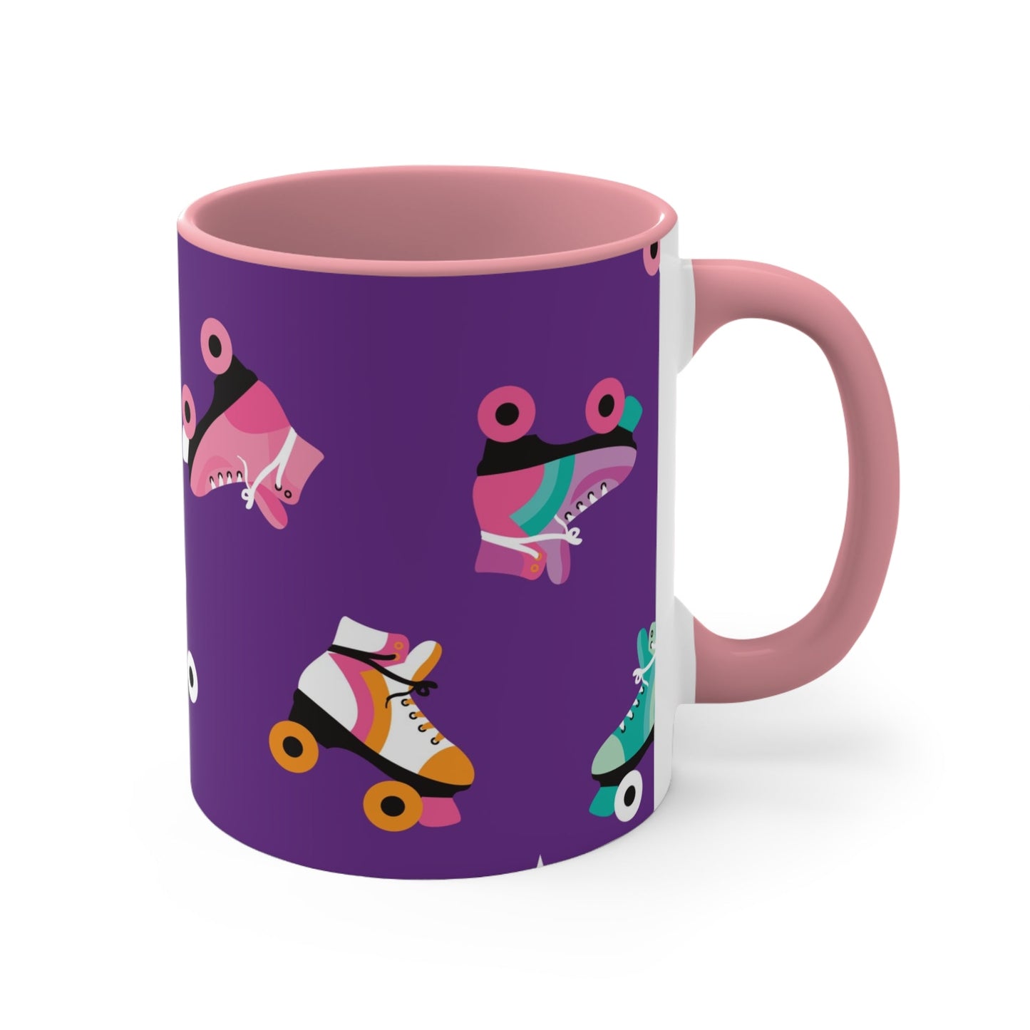 The Printify Roller Skates with a purple background - cute colourful accent mug features a white ceramic coffee mug with a pink handle and interior. Its design is adorned with various colorful roller skate illustrations against a vibrant purple background, showcasing skates in different styles and colors for a playful touch.