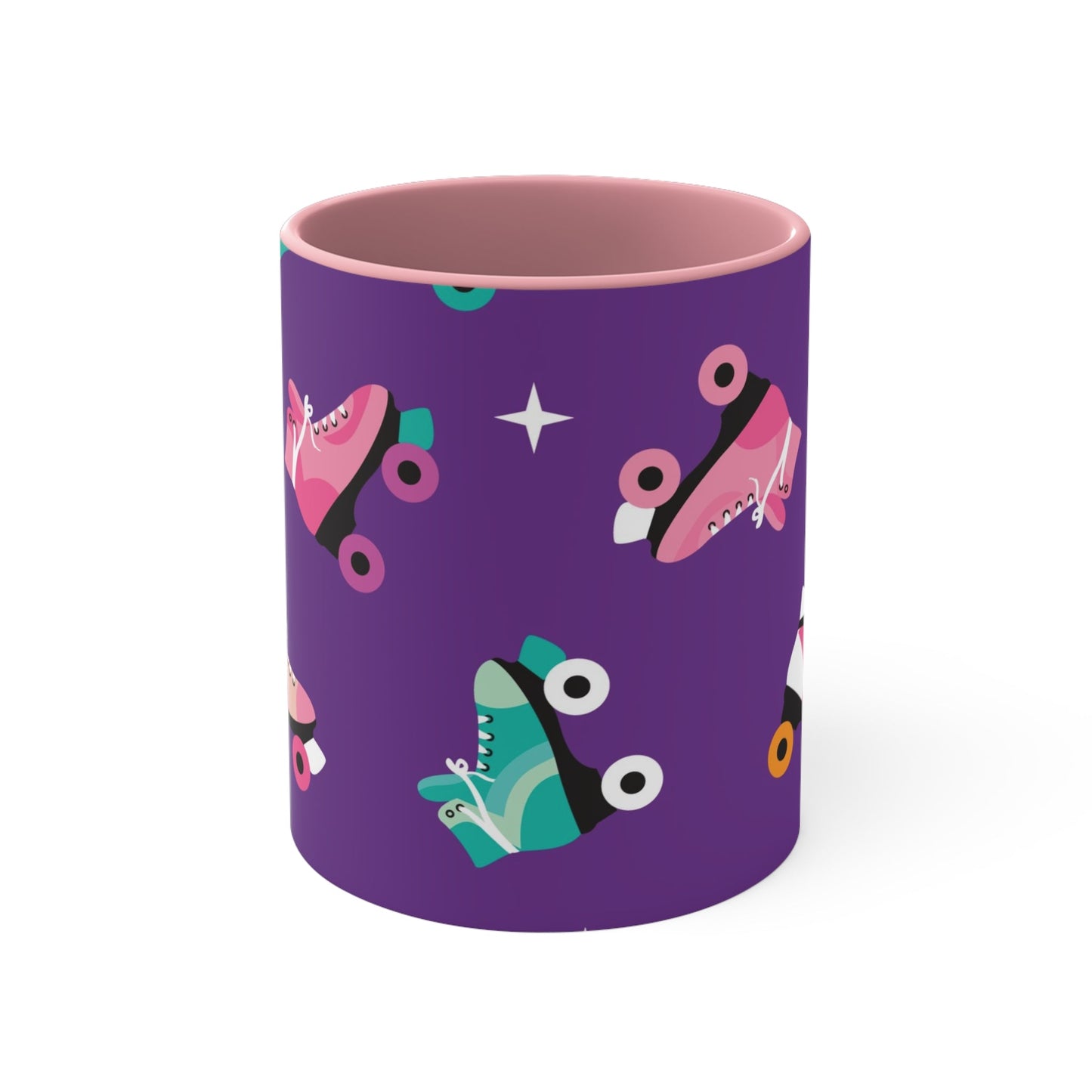 The Printify Roller Skates with a purple background - cute colourful accent mug features a white ceramic coffee mug with a pink handle and interior. Its design is adorned with various colorful roller skate illustrations against a vibrant purple background, showcasing skates in different styles and colors for a playful touch.