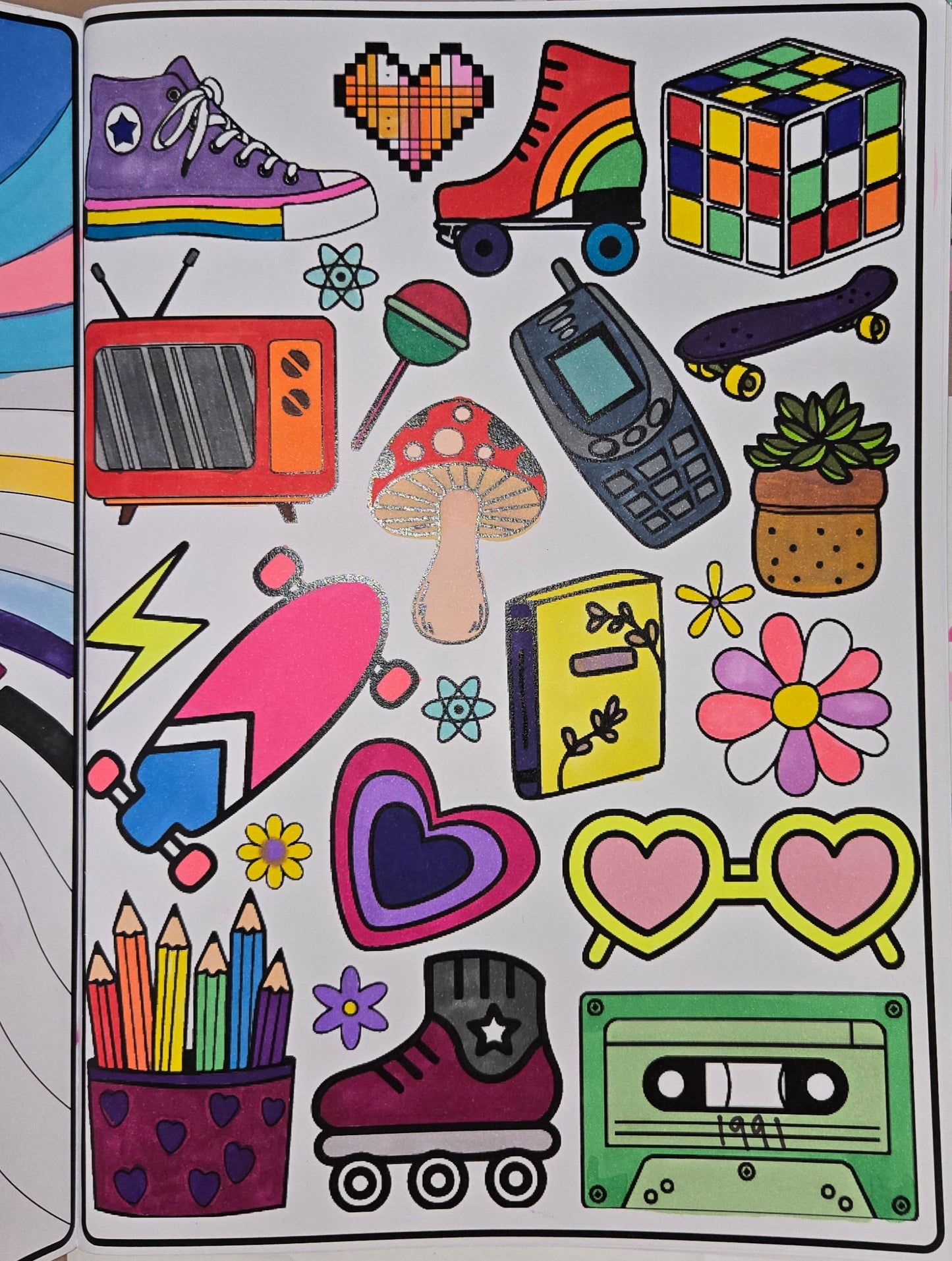 Retro nostalgic 1990s colouring in collage. Nokia, rubiks cube, converse, roller skating, cassette tape, rollerblade, skateboard colouring in