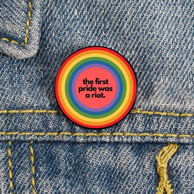 The first pride was a riot rainbow pride badge pin