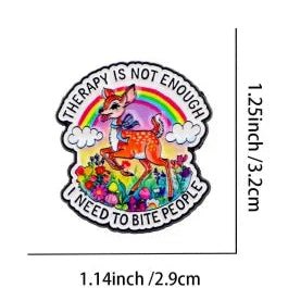 Colorful enamel pin with a deer, rainbow and flowers with text "Therapy Is Not Enough I Need To Bite People"