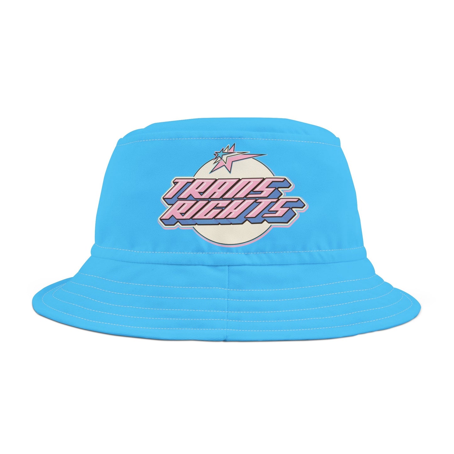 The Trans Rights Blue Bucket Hat is an adorable blue accessory adorned with a stylized graphic illustration. It features the bold, retro-inspired text "TRANS RIGHTS" in shades of pink, white, and blue (the trans flag) on a white background, accented with pink and blue sparkles. Crafted from practical polyester, it's both stylish and functional.