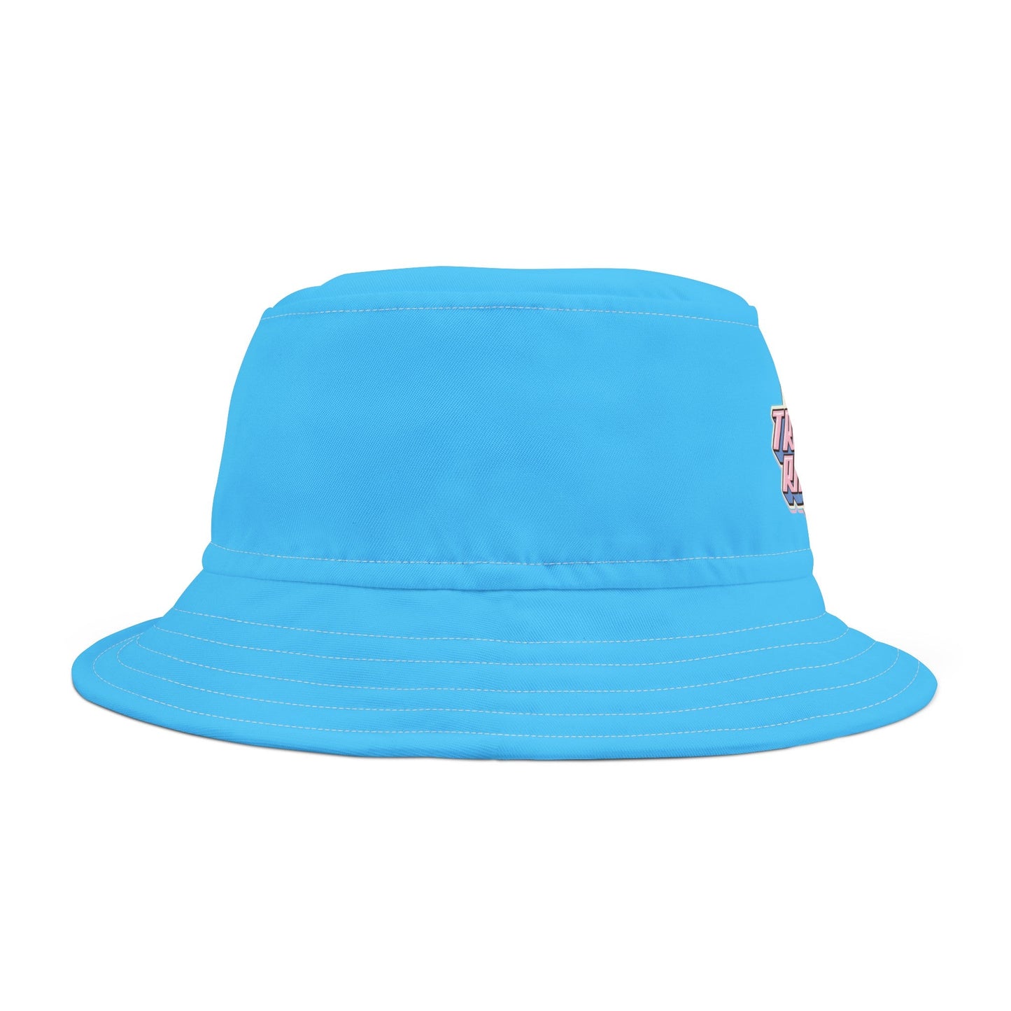 The Trans Rights Blue Bucket Hat is an adorable blue accessory adorned with a stylized graphic illustration. It features the bold, retro-inspired text "TRANS RIGHTS" in shades of pink, white, and blue (the trans flag) on a white background, accented with pink and blue sparkles. Crafted from practical polyester, it's both stylish and functional.
