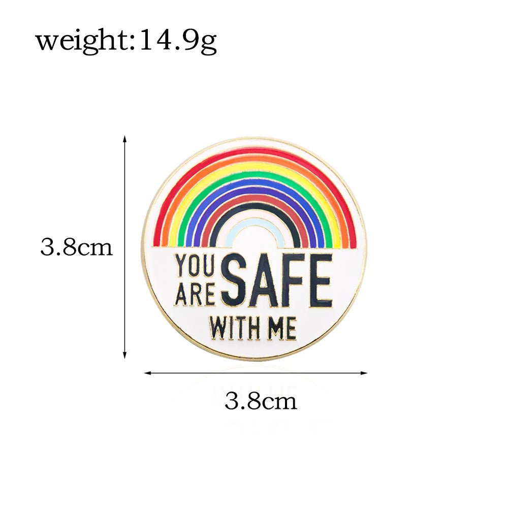 The "You Are Safe With Me" badge celebrates rainbow and trans pride, measuring 3.8 cm x 3.8 cm and weighing 14.9g—a perfect addition to your collection of ally badges or pride key rings.