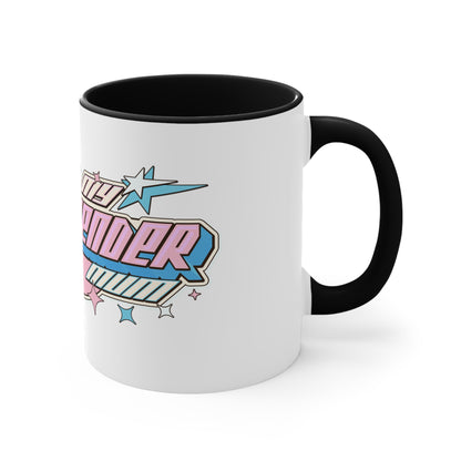 The "I Love My Transgender Mum" original design accent mug by Printify is a white ceramic mug with a vibrant pink interior. It features the stylized word "Transcend," adorned with stars and gradient shades of pink, blue, and purple that represent the colors of the transgender pride flag.