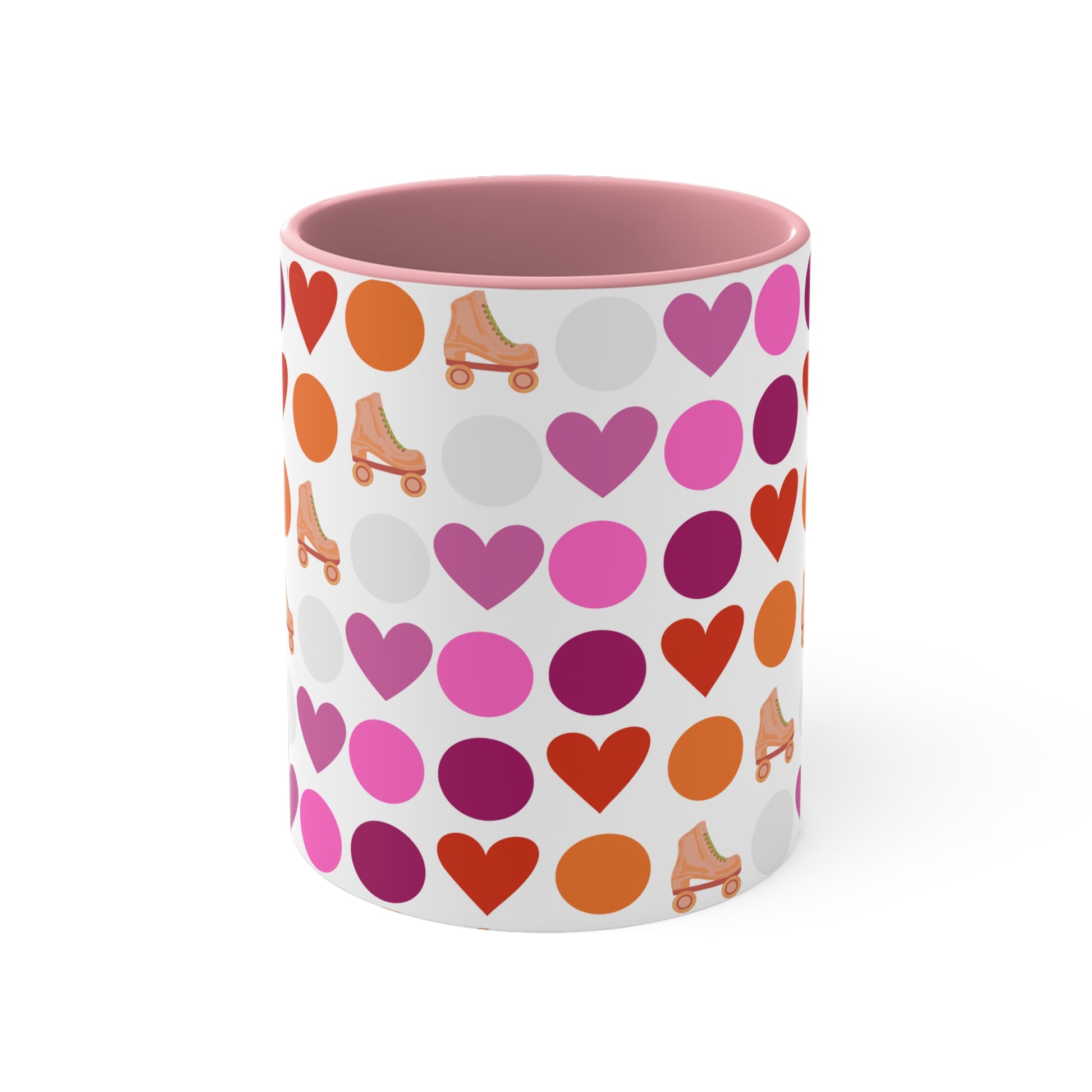 The Subtle Lesbian Pride + Roller Skate Colourful Accent Mug by Printify is a white ceramic mug featuring a red handle and a vibrant interior. It is adorned with a playful pattern of hearts, circles, and roller skates in an array of colors, including pink, purple, orange, and red.