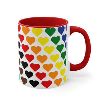 Introducing the Progress Pride Flag Love Hearts - Colourful Accent Mug by Printify: a ceramic mug featuring a vibrant red handle and a lively interior, adorned with diagonally arranged rows of hearts in shades of purple, blue, pink, green, and yellow. The hearts are evenly spaced across the surface, creating a charming and festive design.