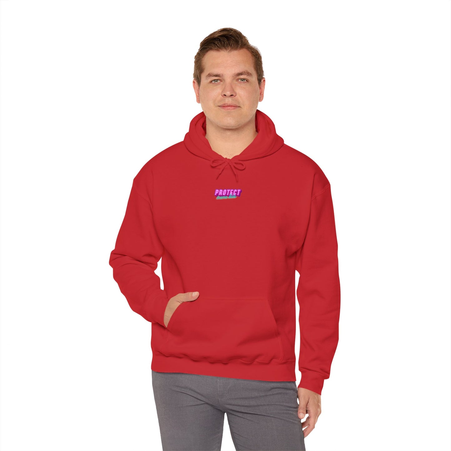 Against a white backdrop, a person models the Protect Trans Kids Hoodie - Australian Shipping, featuring purple and pink embroidered "Protect" lettering on a red unisex sweatshirt. Made from ethically grown cotton, one hand casually rests in the pocket, showcasing its comfort and style.