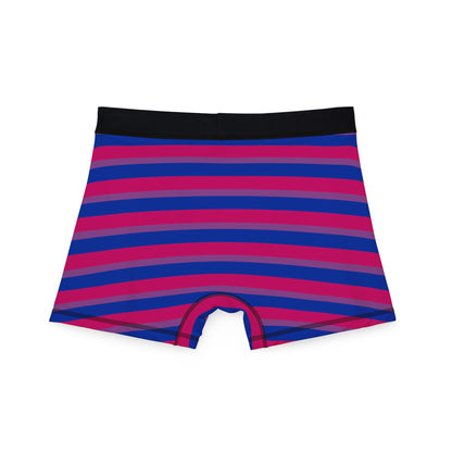 The Copy of Trans Rights Boxers - original design by Printify are men's boxer briefs showcasing diagonal stripes in shades of purple, blue, and red. Crafted from comfortable fabric, they feature a black waistband with bold "BIG ENERGY" stylized text at the front center. Celebrate inclusivity with these vibrant underpants from a proudly trans-owned business.