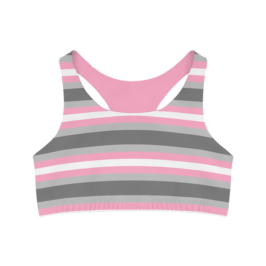 Introducing the Printify Demi Girl pride flag seamless sports crop – a supportive active wear top featuring horizontal stripes in shades of pink, gray, and white. The vibrant pink racerback is made from moisture-wicking fabric to ensure optimal comfort during workouts.